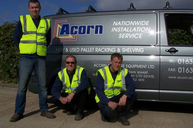 Acorn Storage Team Next to Van
